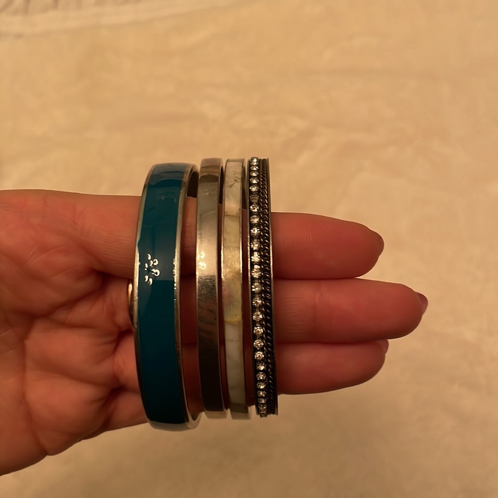 Set of silver and teal bangles